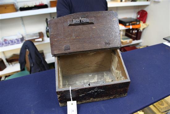 A 17th century oak and pine lap desk, W.1ft. D.7.5in. H.6.75in., initialled IP